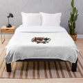 Whimsical chibi characters and stickman figures on a cozy autumn-themed plush blanket