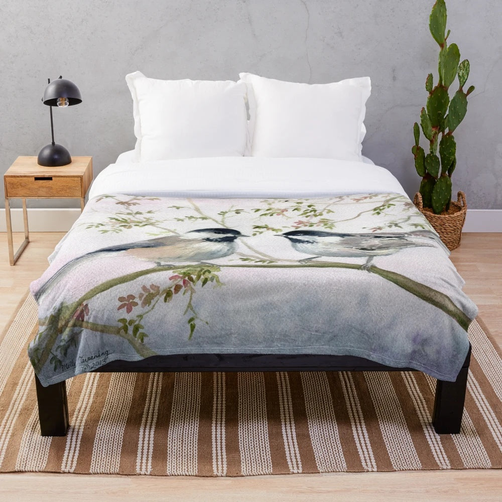 Soft and cozy chickadee plush blanket with nature-inspired design