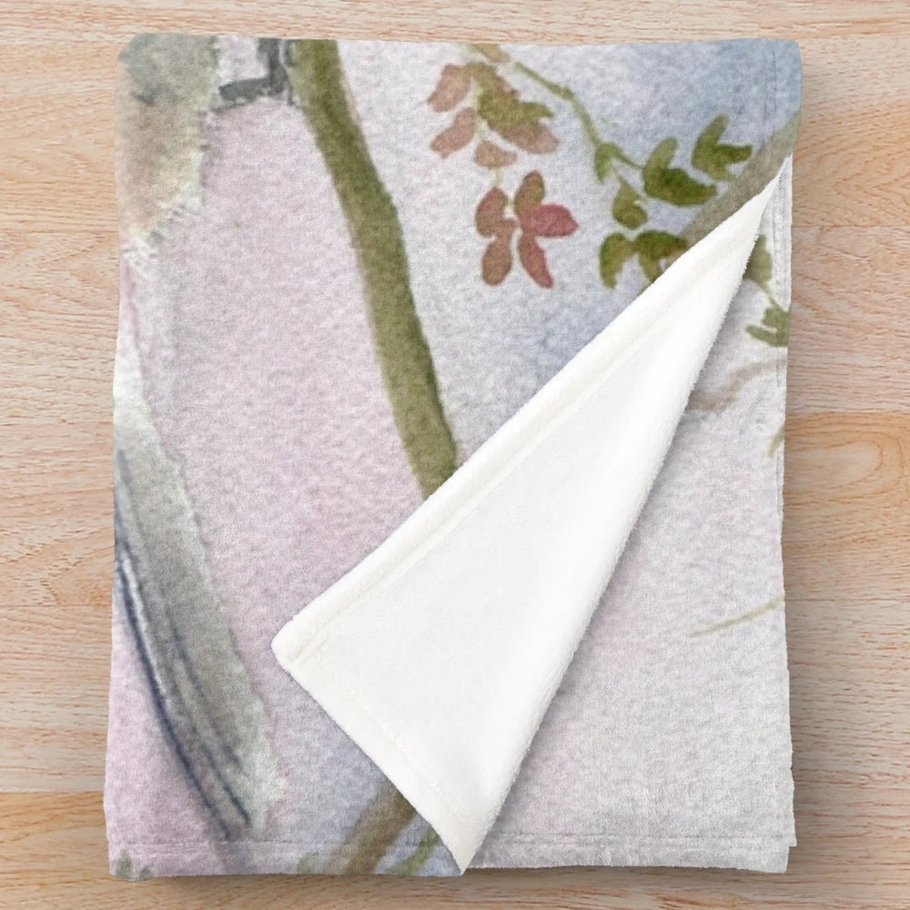 Soft and cozy chickadee plush blanket with nature-inspired design