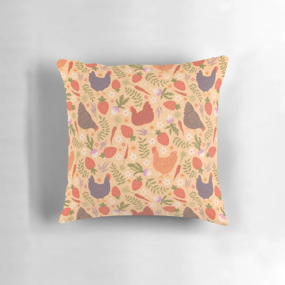 A decorative throw pillow featuring a whimsical pattern of chickens, strawberries, carrots, lavender, and turnips - perfect for a cozy, nature-inspired home.