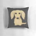 Longhaired cream-colored dachshund cartoon pillow, a cozy and adorable accessory for dog owners.