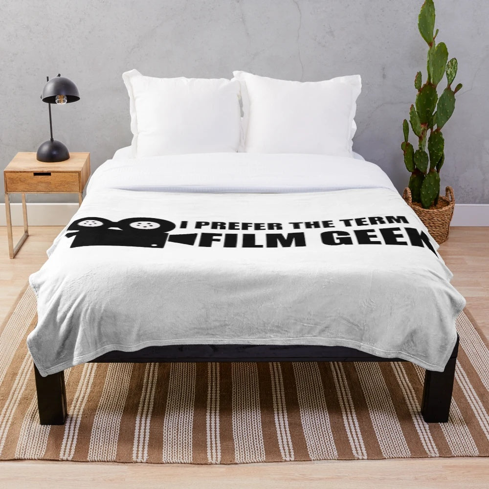 A cozy plush blanket featuring a fun film geek design, perfect for Disney fans