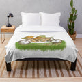 Frog and toad plush blanket with animal print design