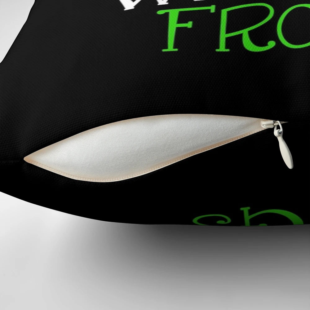 A decorative pillow featuring a whimsical frog design, perfect for frog enthusiasts.