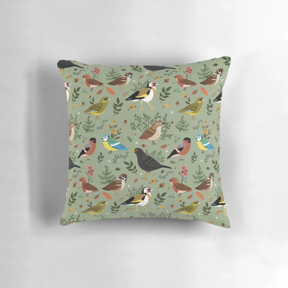 A decorative pillow featuring a colorful pattern of British garden birds such as sparrows, blackbirds, robins, and finches.