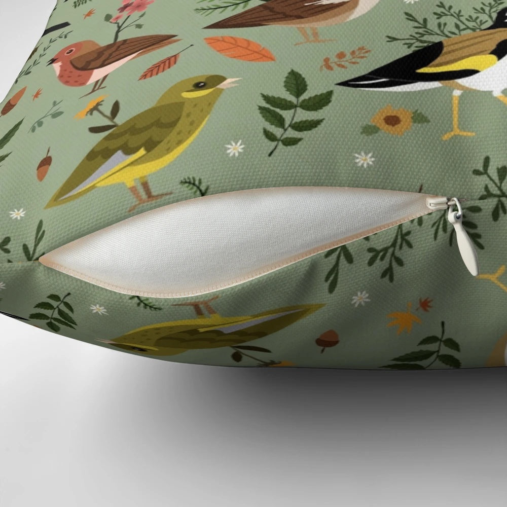 A decorative pillow featuring a colorful pattern of British garden birds such as sparrows, blackbirds, robins, and finches.