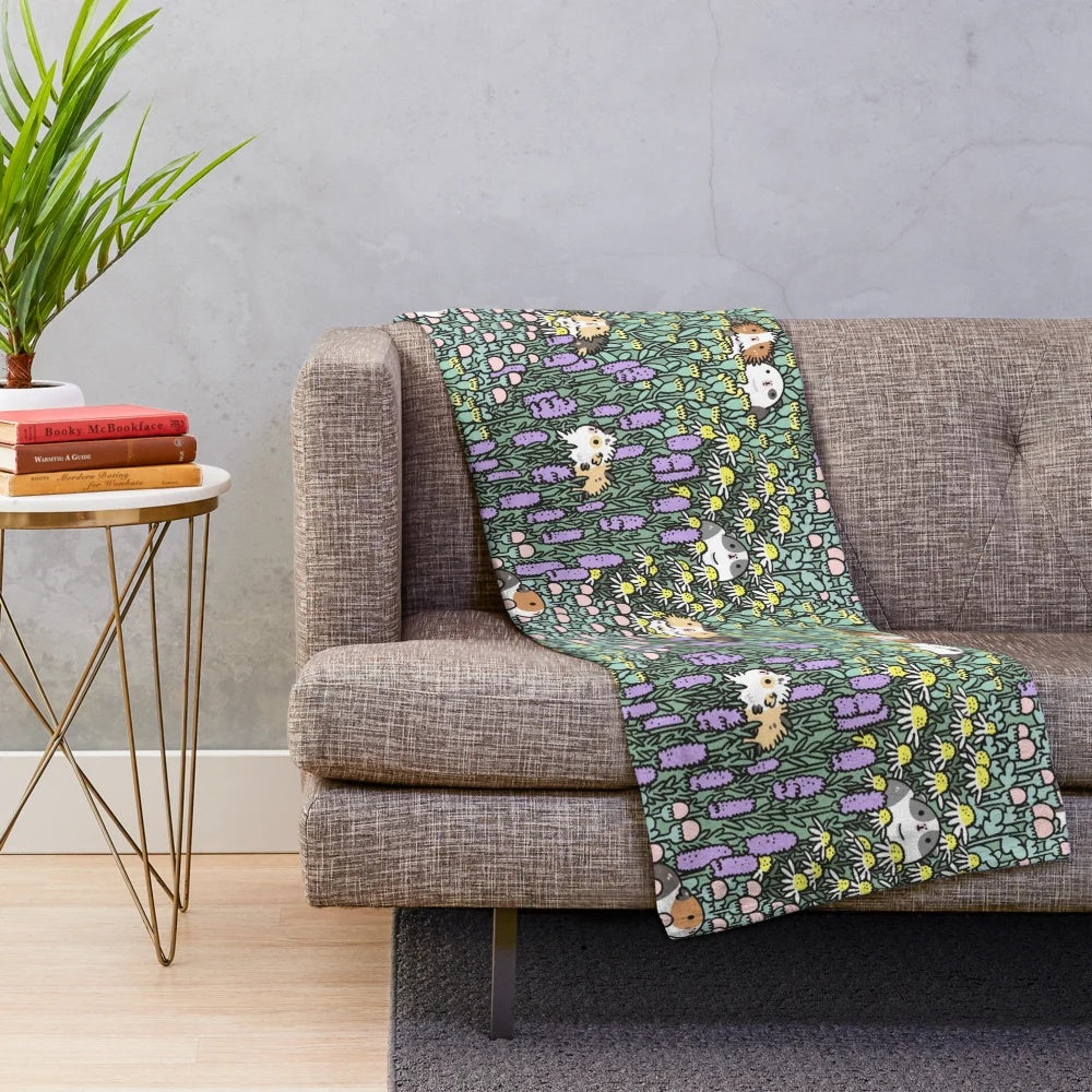 Cozy plush blanket with a whimsical guinea pig and herb garden design