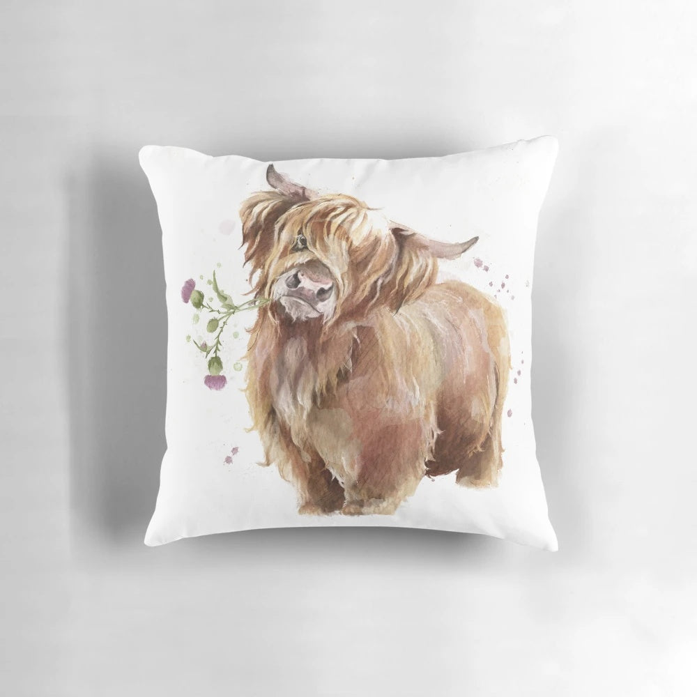 A watercolor illustration of a majestic highland cow, featured on a cozy throw pillow.