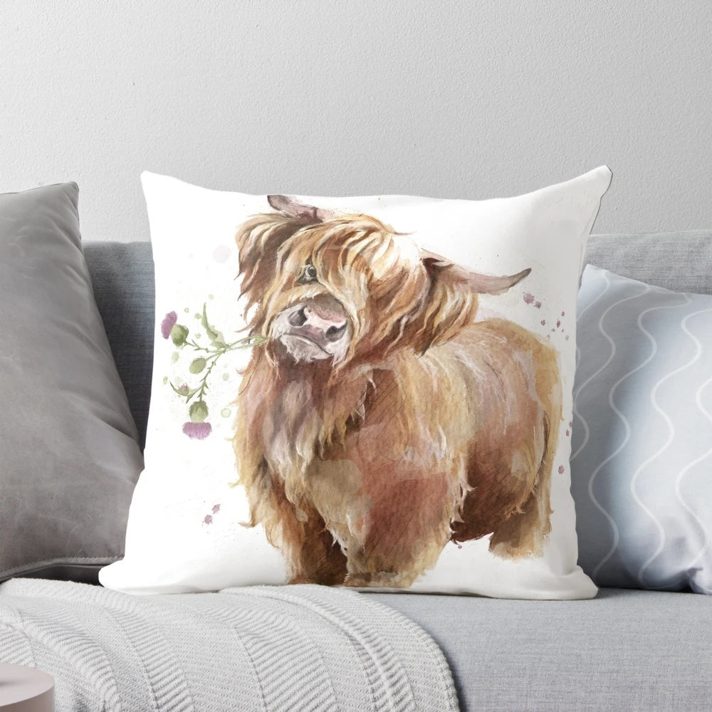 A watercolor illustration of a majestic highland cow, featured on a cozy throw pillow.