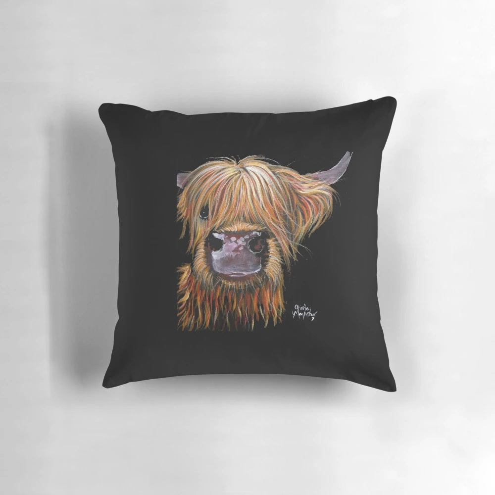 A plush pillow featuring a whimsical highland cow design