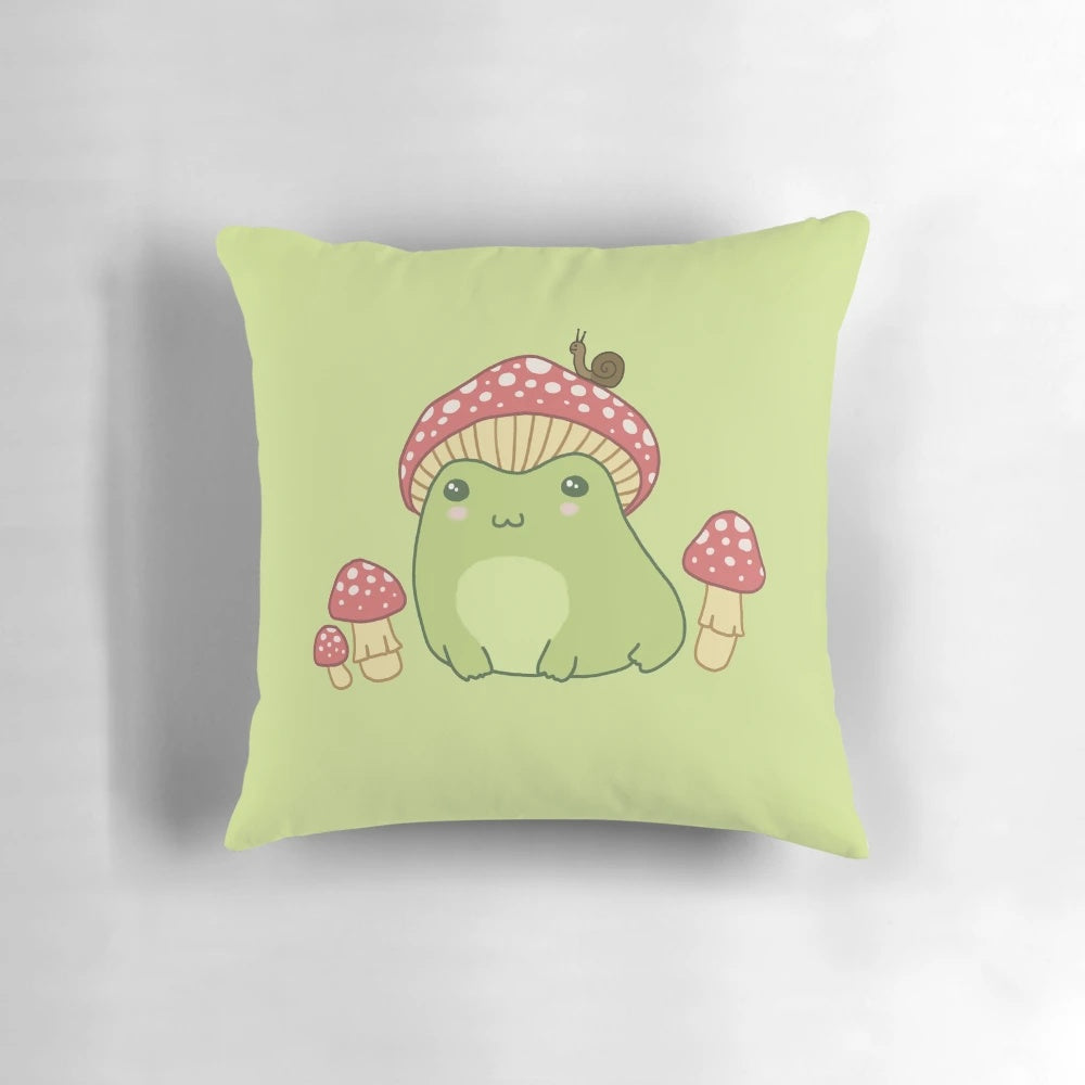 A cute and whimsical pillow featuring a kawaii frog wearing a mushroom-inspired hat, perfect for cottage core and nature lovers.