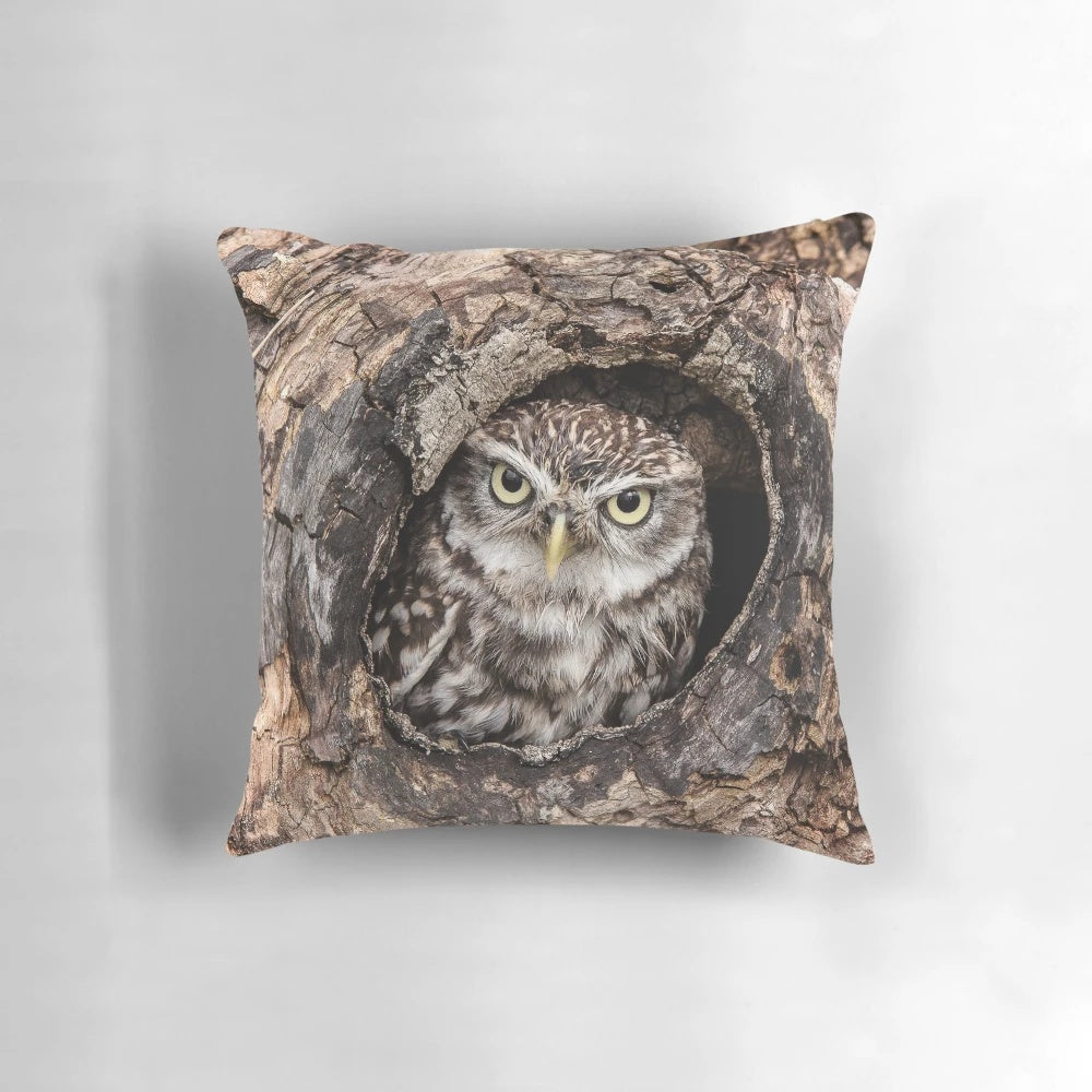 Cozy decorative pillow featuring a charming little owl perched on a tree branch