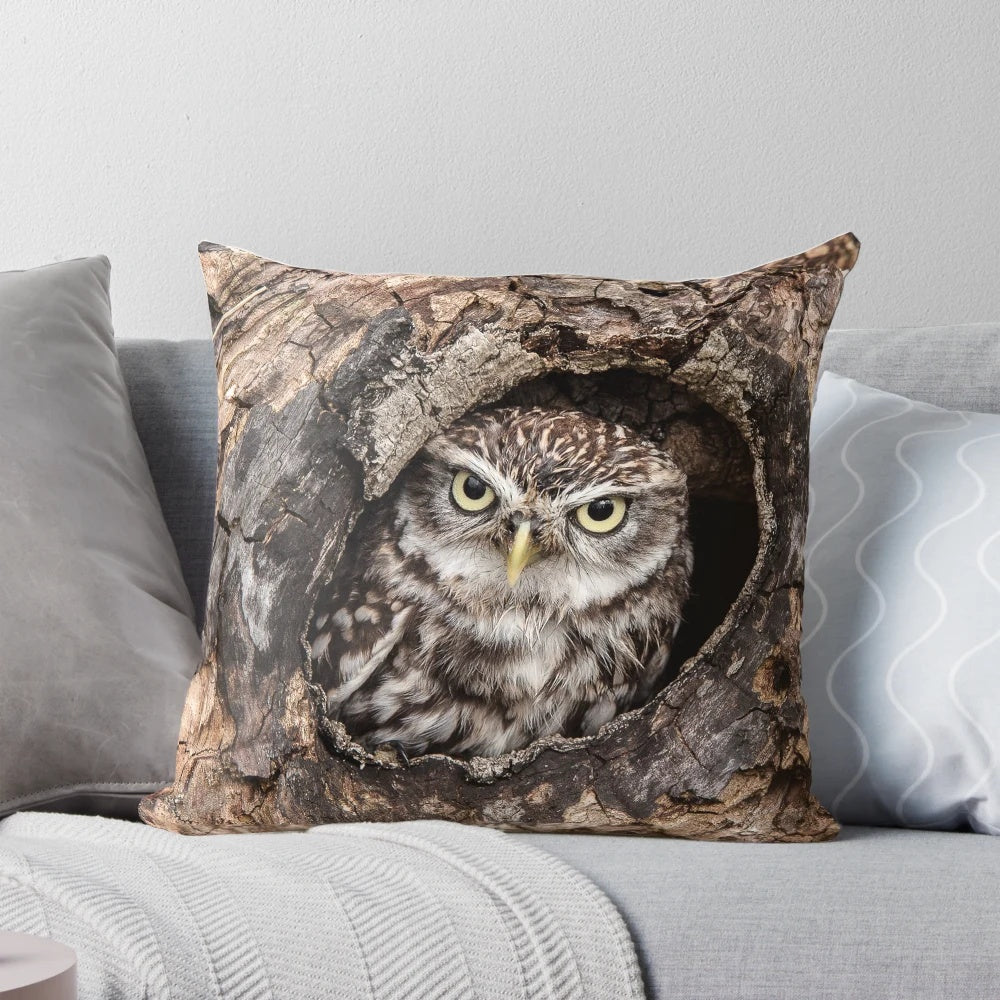 Cozy decorative pillow featuring a charming little owl perched on a tree branch