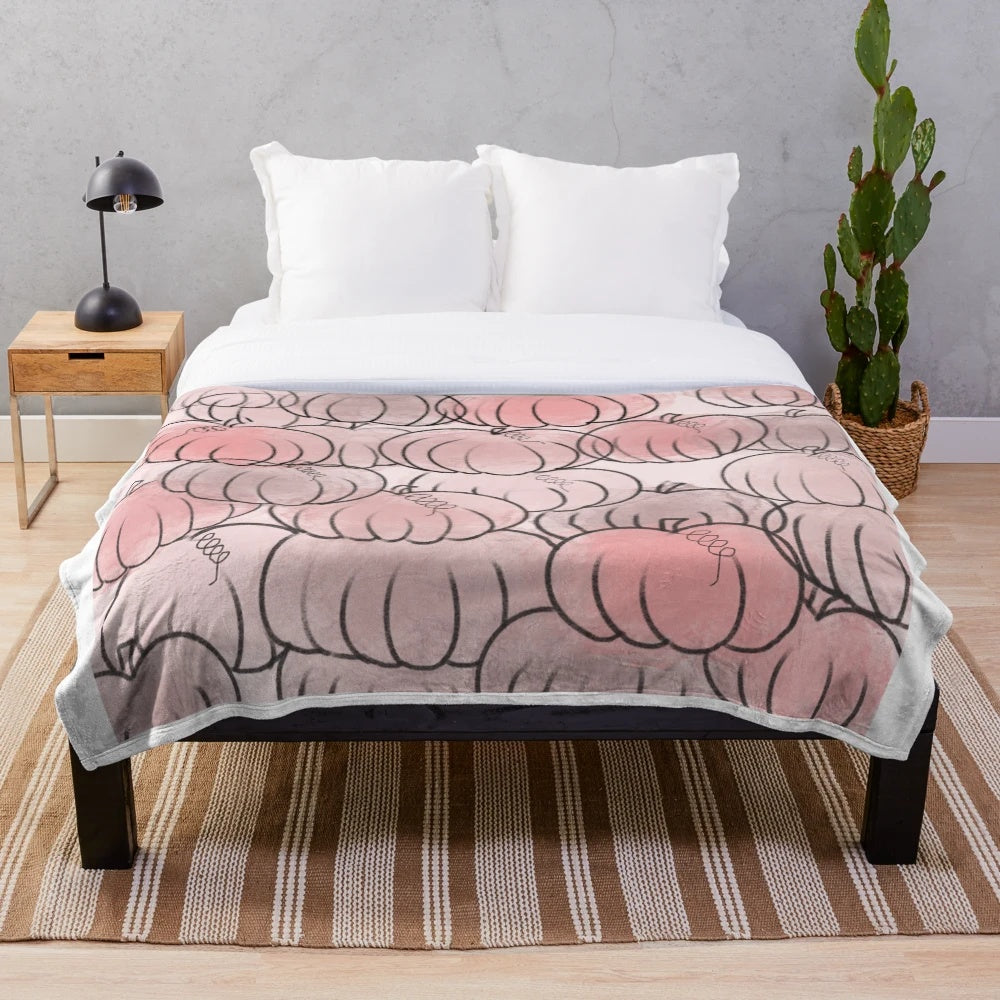 Soft, hand-drawn pink pumpkin plush blanket for a cozy, fall aesthetic