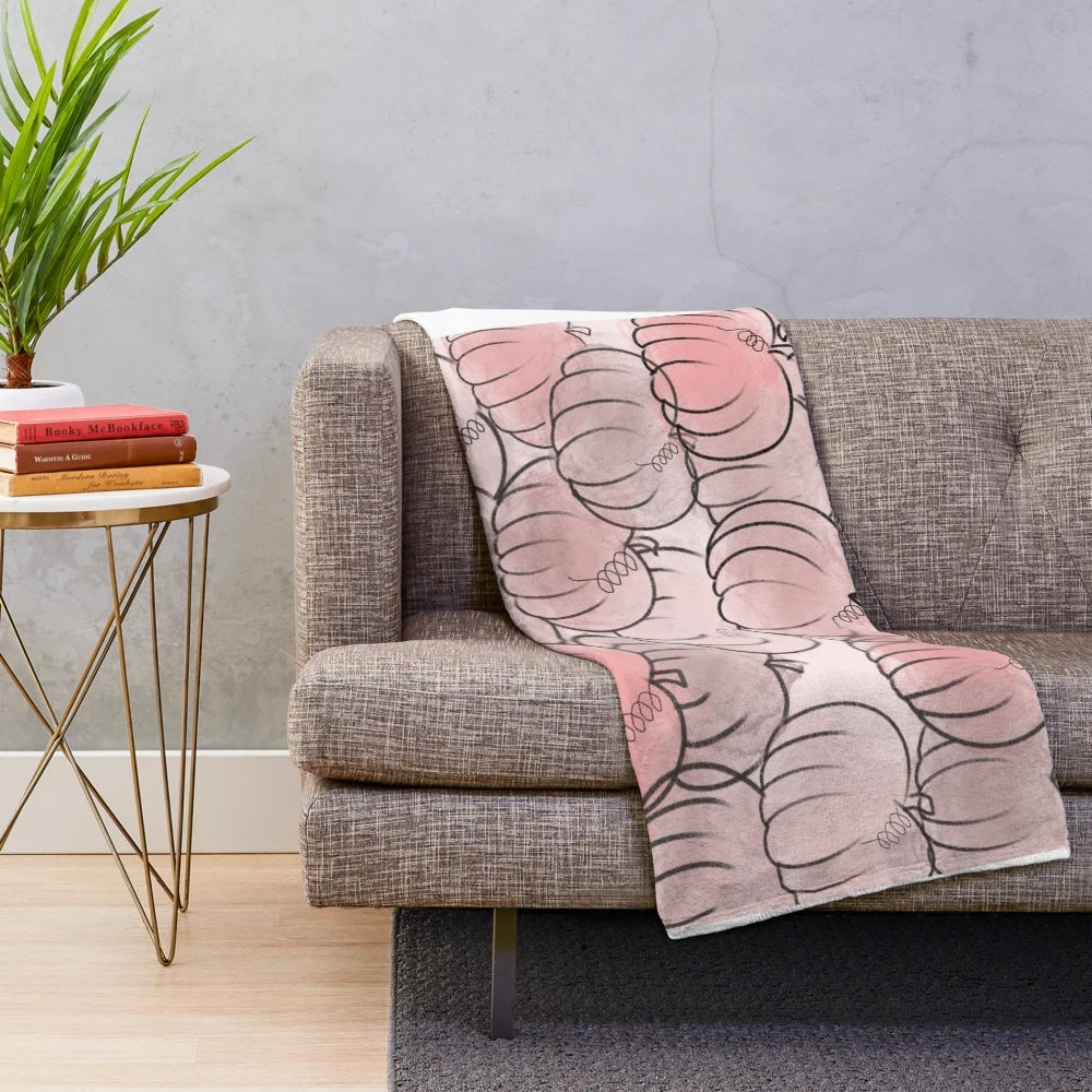 Soft, hand-drawn pink pumpkin plush blanket for a cozy, fall aesthetic