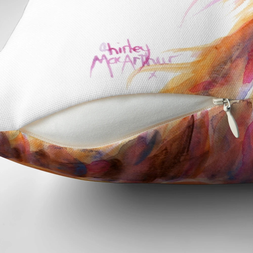 A cozy Scottish Highland Cow pillow with a 'Sweet Satsuma' design by artist Shirley MacArthur.