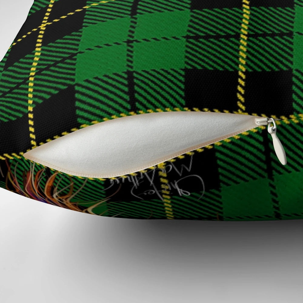 Colorful tartan-patterned pillow cover featuring an illustration of a friendly Scottish Highland cow