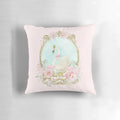 A shabby chic pillow featuring a delicate watercolor-style white swan with a gold crown and pink flowers.