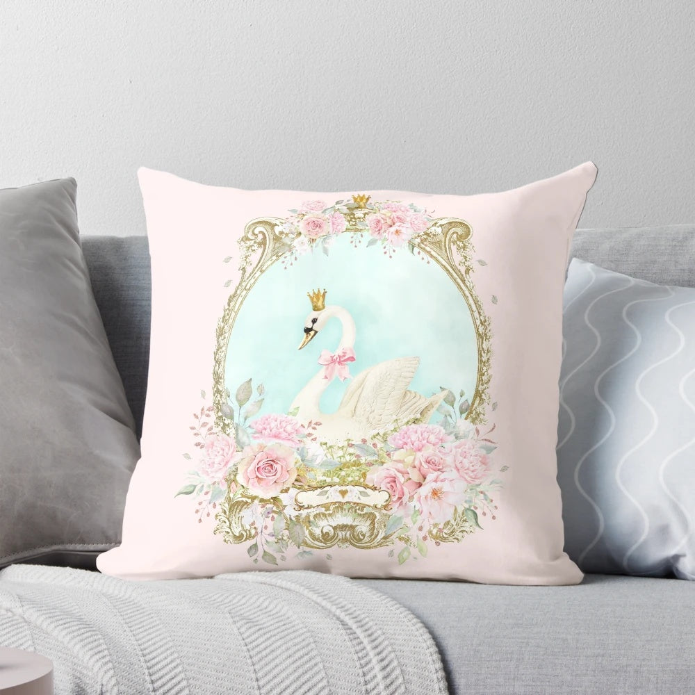 A shabby chic pillow featuring a delicate watercolor-style white swan with a gold crown and pink flowers.