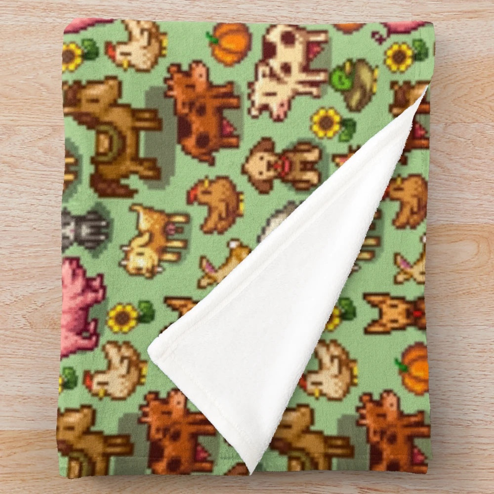 Stardew Valley inspired plush blanket with pixel art cow, sheep, dog, and cat designs