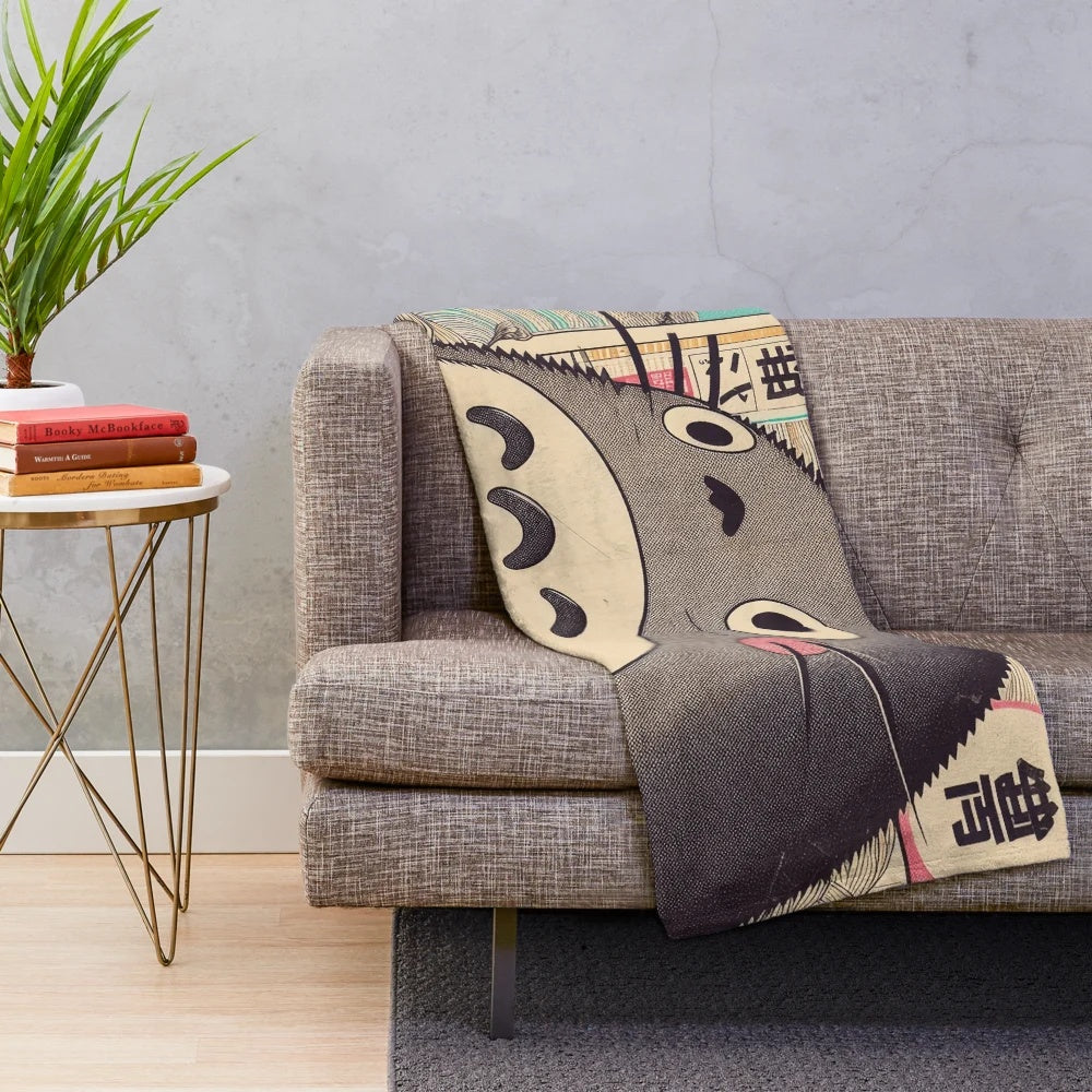 Vintage Japanese plush blanket featuring a charming retro design of a Japanese cultural icon