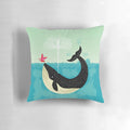 Decorative pillow featuring a whimsical illustration of a whale and bird in a coastal scene