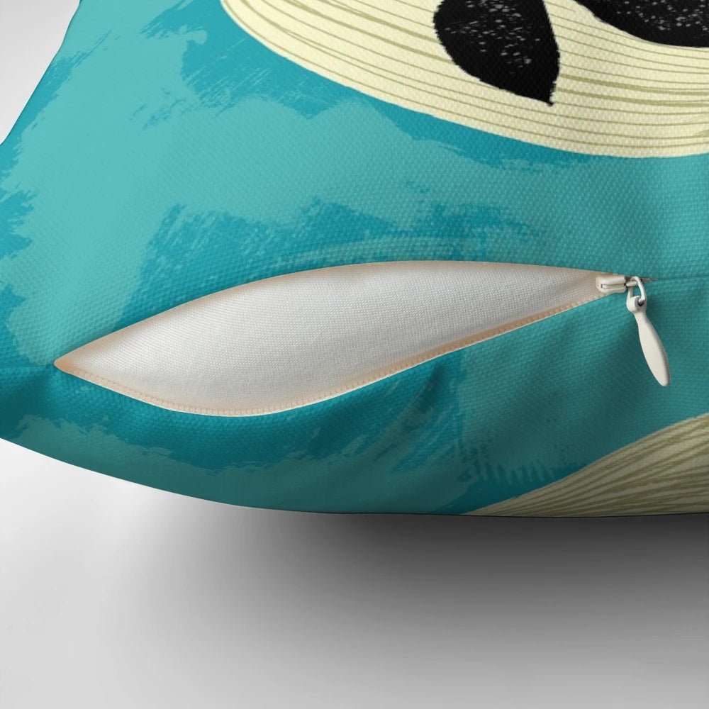 Decorative pillow featuring a whimsical illustration of a whale and bird in a coastal scene