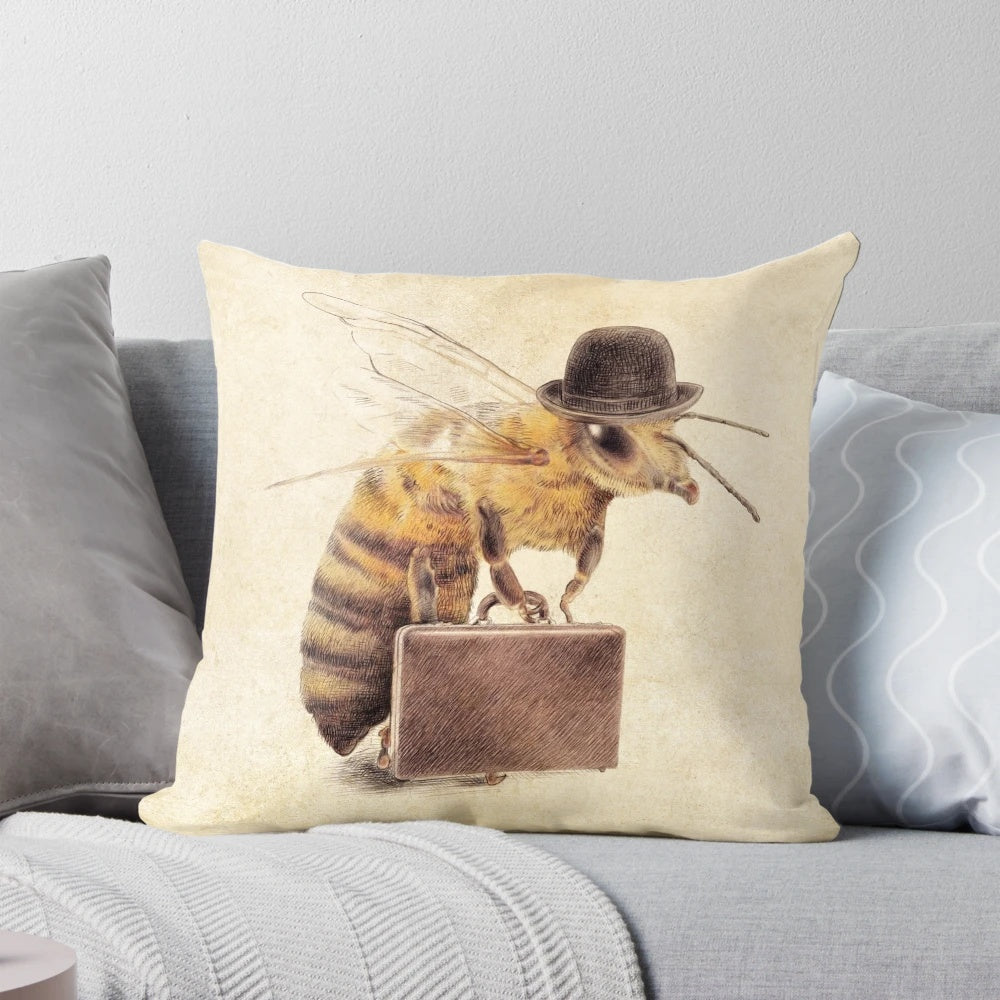 A decorative pillow featuring a worker bee dressed in business attire with a briefcase.