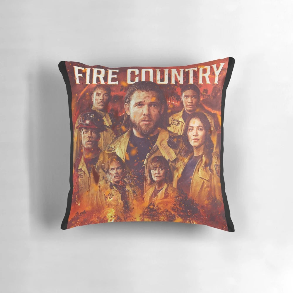Fiery, scorched pillow with characters from the TV show Fire Country