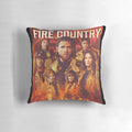 Fiery, scorched pillow with characters from the TV show Fire Country