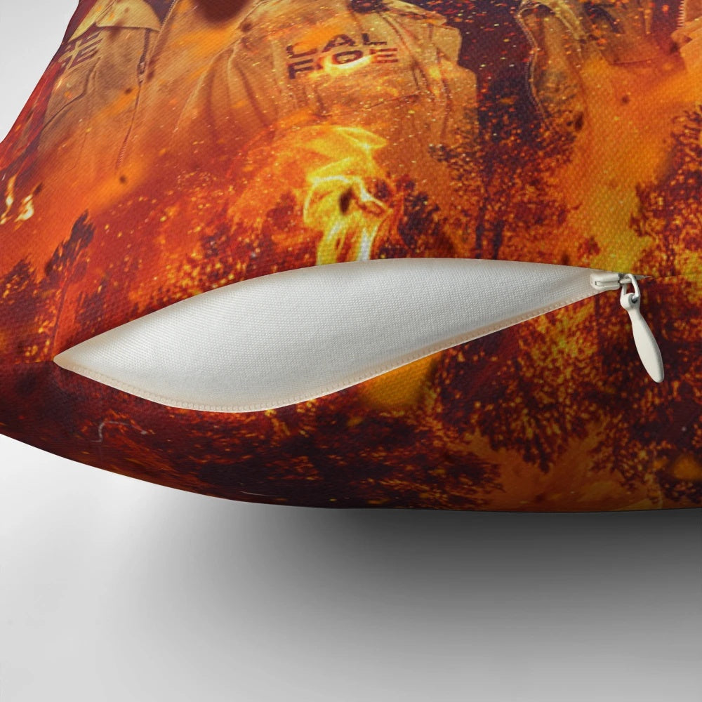 Fiery, scorched pillow with characters from the TV show Fire Country