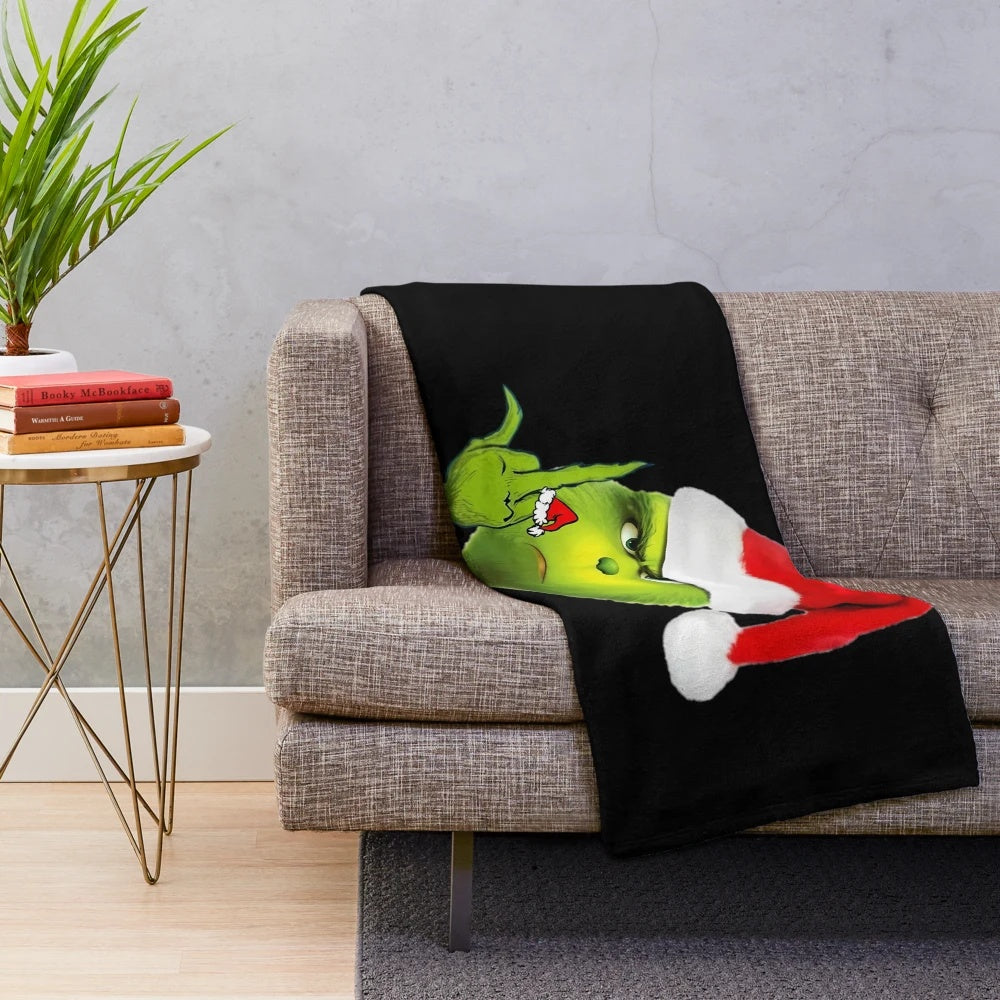 Grinch plush blanket with a middle finger design