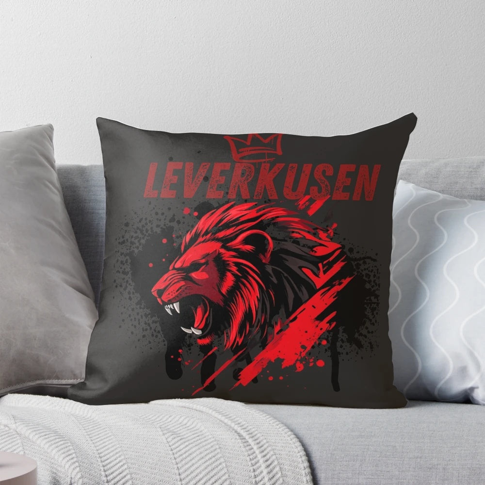 Soft, plush lion pillow in the colors of Bayer Leverkusen football club