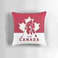 Team Canada hockey-themed decorative pillow featuring a maple leaf and puck design