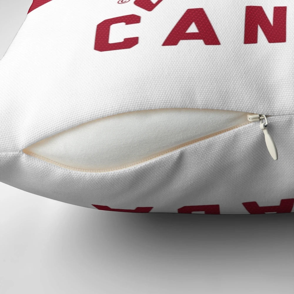 Team Canada hockey-themed decorative pillow featuring a maple leaf and puck design