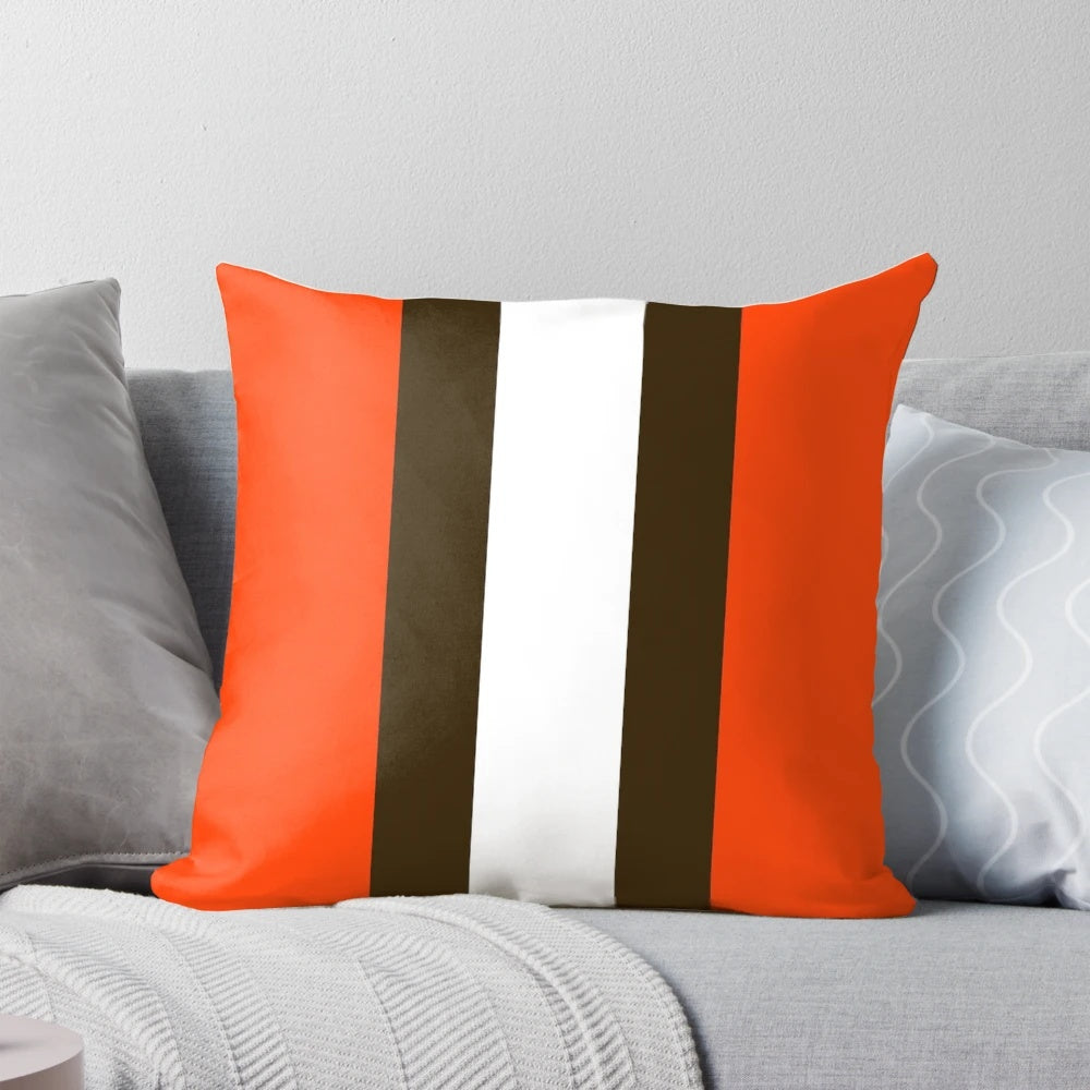A cozy pillow featuring the colors and theme of the Cleveland Browns football team