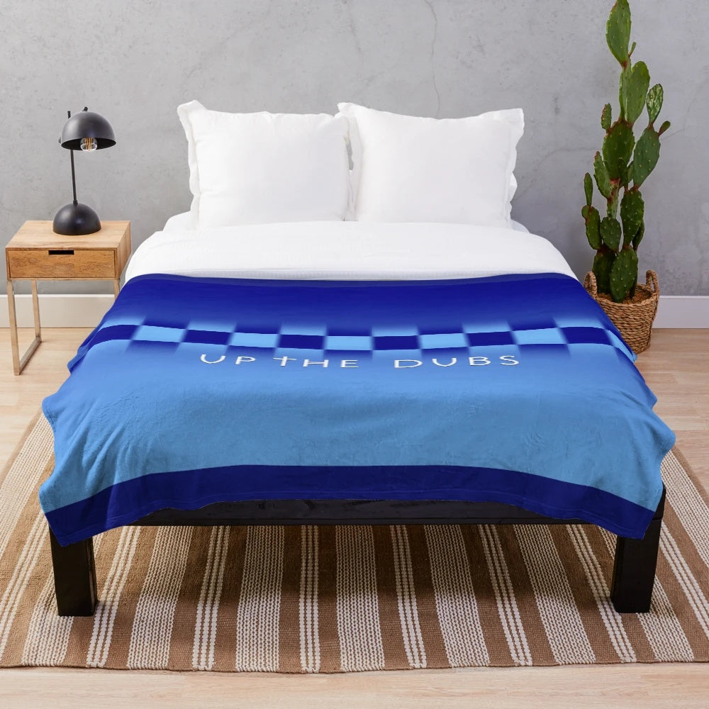 Plush blue blanket with Dublin Gaelic football design