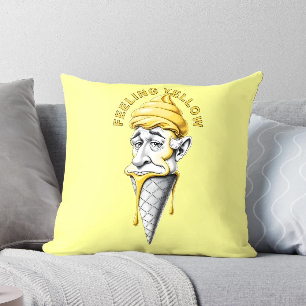 A soft, yellow pillow with a happy, expressive ice cream design