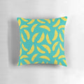 Vibrant yellow banana-patterned pillow with a happy, cartoon-like design