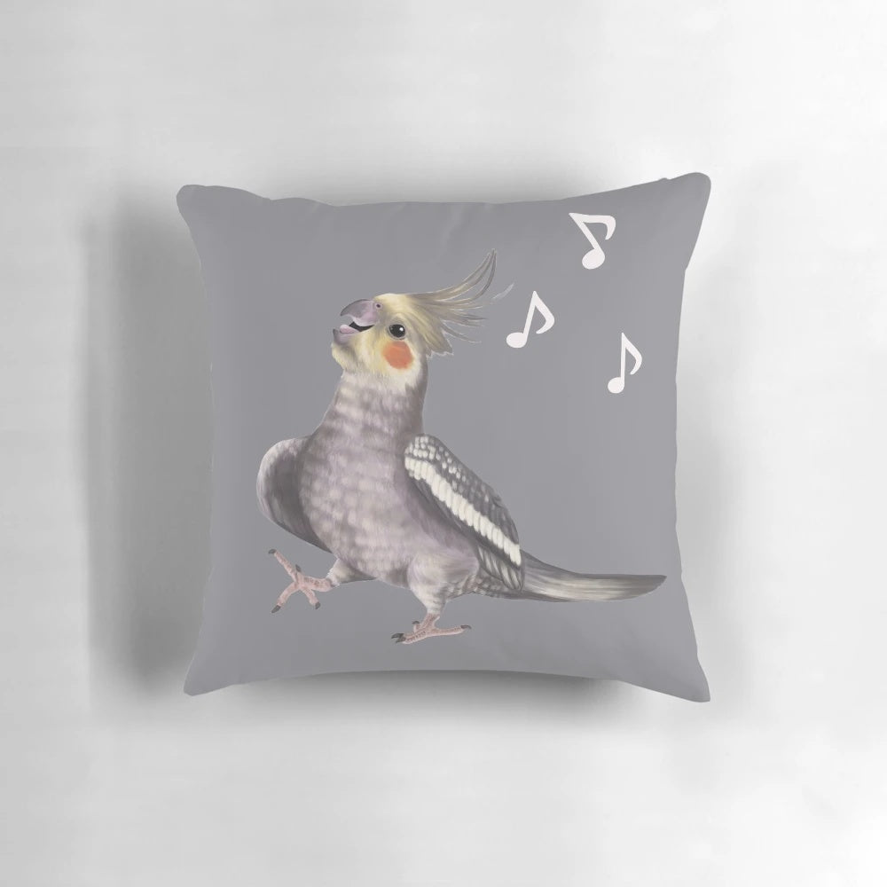 Colorful decorative pillow featuring a happy, singing cockatiel surrounded by musical notes.