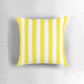 A vibrant yellow and white striped deckchair pattern pillow, perfect for adding a touch of cheerfulness and positivity to your home.