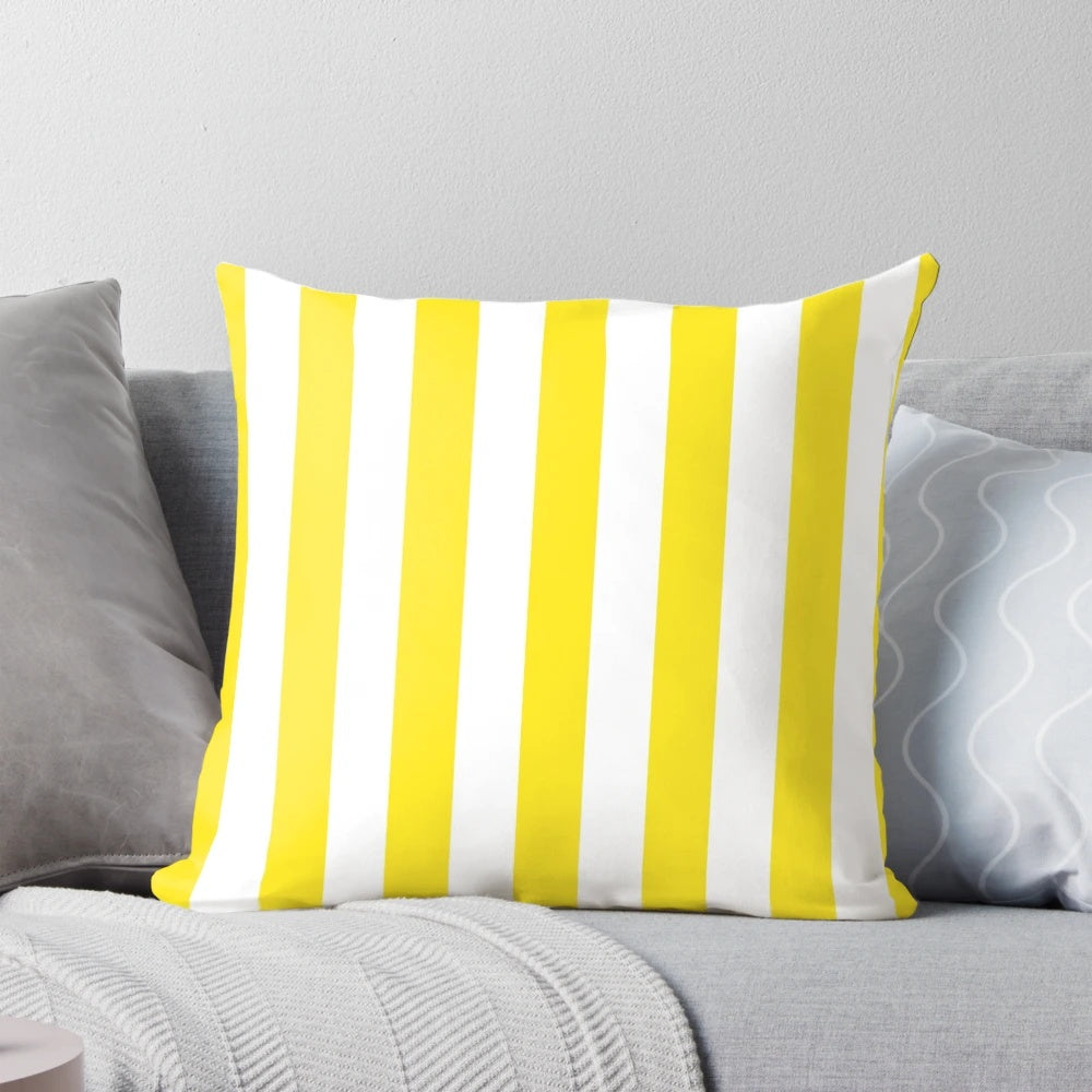 A vibrant yellow and white striped deckchair pattern pillow, perfect for adding a touch of cheerfulness and positivity to your home.