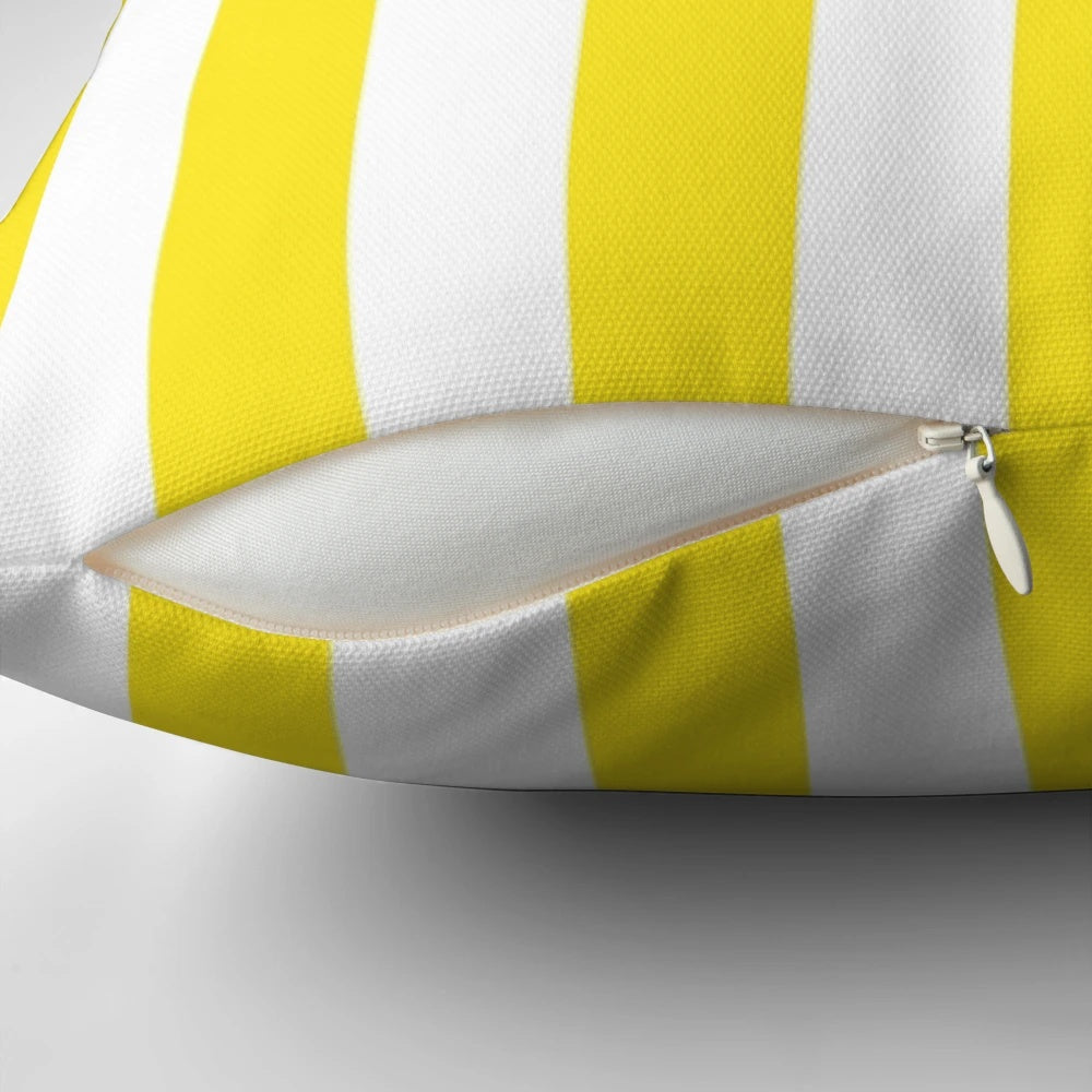A vibrant yellow and white striped deckchair pattern pillow, perfect for adding a touch of cheerfulness and positivity to your home.