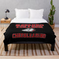 Cheerleading plush blanket featuring the Navarro Bulldogs logo and team colors