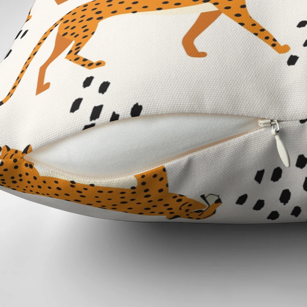 Cheetah print pattern decorative pillow with abstract floral and leaf elements