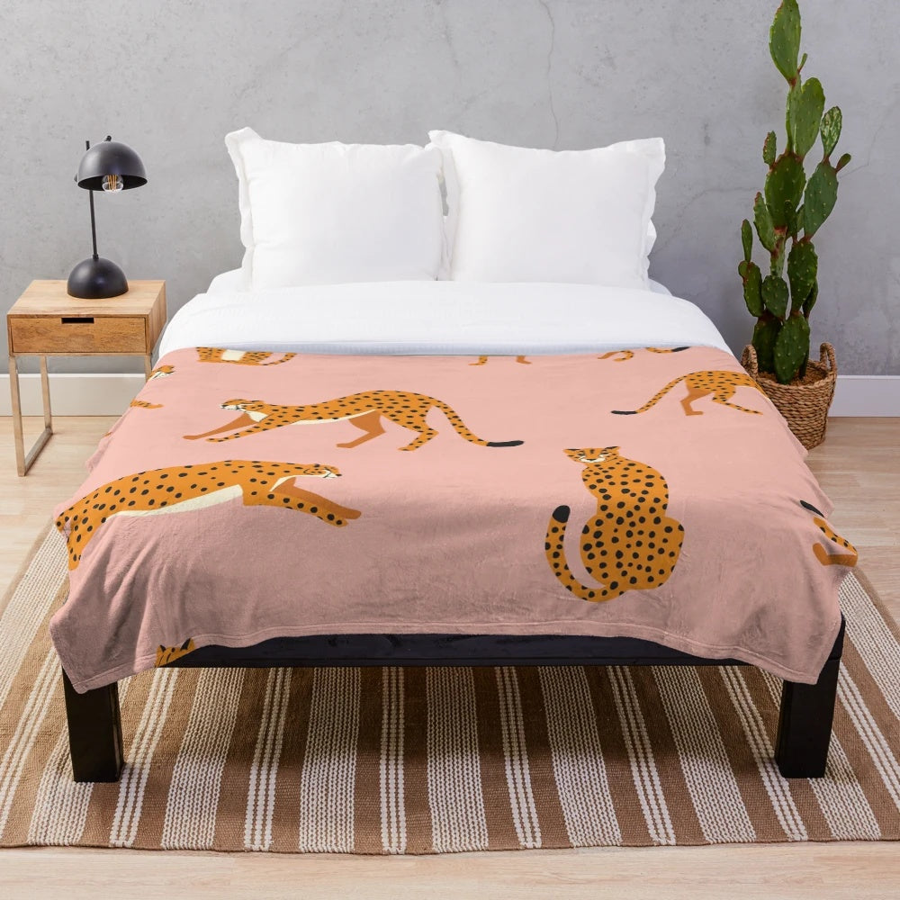 Cheetah pattern plush blanket in pink