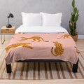 Cheetah pattern plush blanket in pink