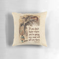 Decorative pillow featuring the quote "We're All Mad Here" from the Cheshire Cat in Alice in Wonderland by Lewis Carroll.