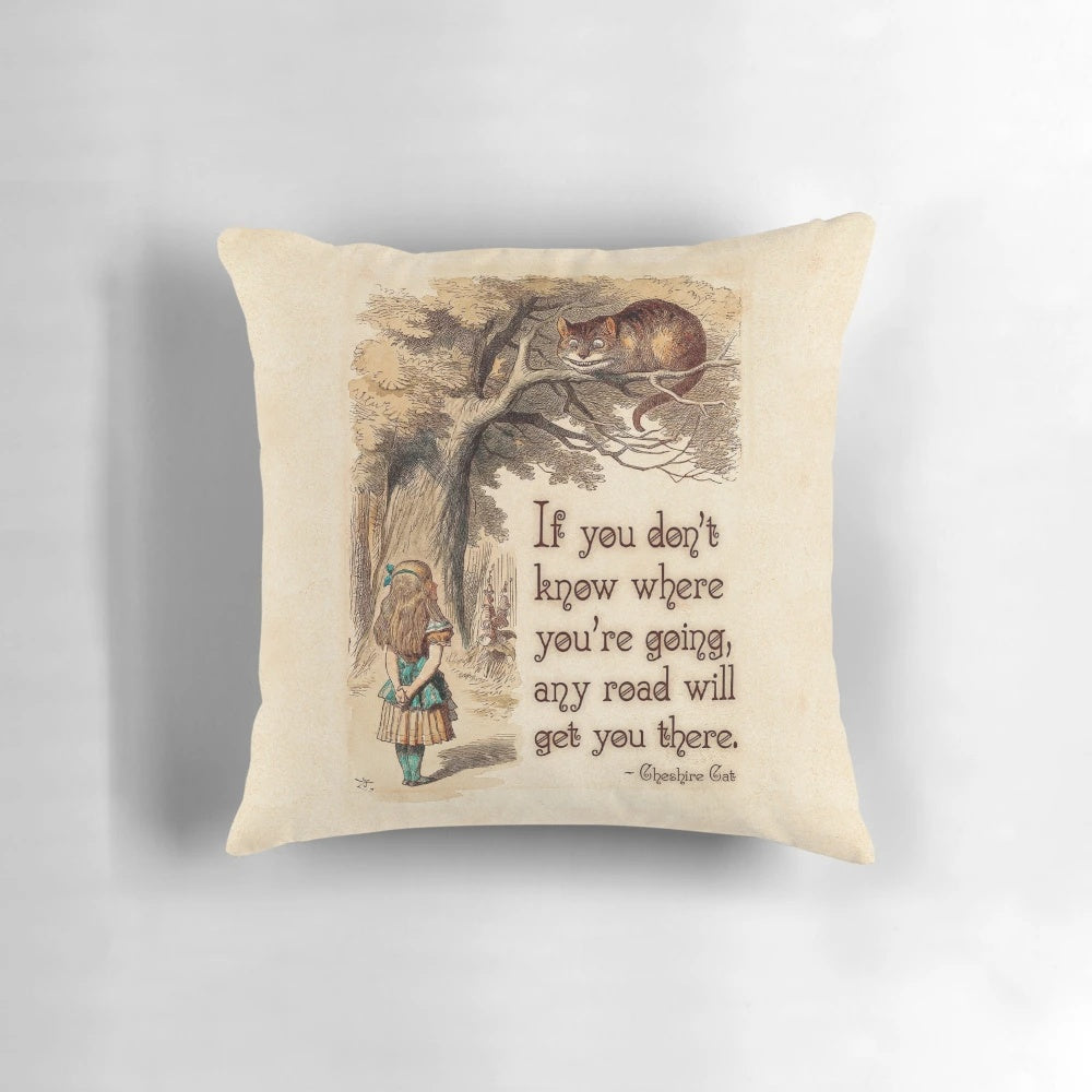 Decorative pillow featuring the quote "We're All Mad Here" from the Cheshire Cat in Alice in Wonderland by Lewis Carroll.