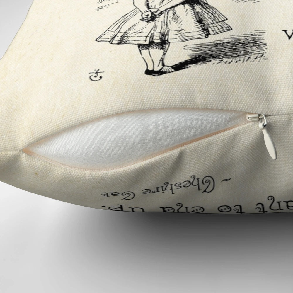 Decorative throw pillow featuring a quote from the Cheshire Cat in Alice in Wonderland by Lewis Carroll